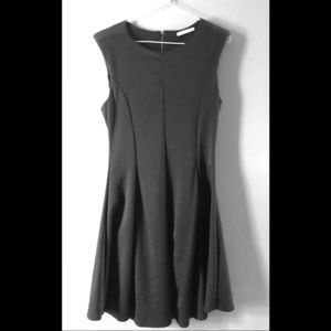 Tiny shoulder pad mini black dress